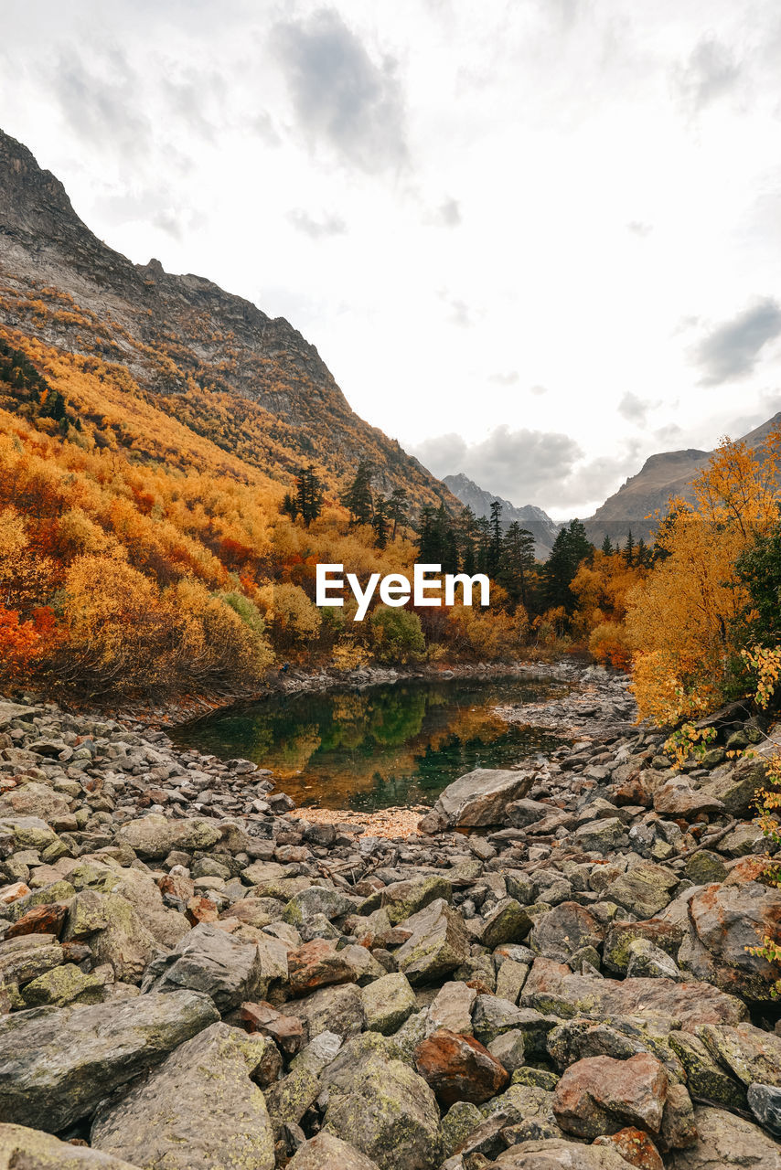 Scenic view of mountains against sky during autumn