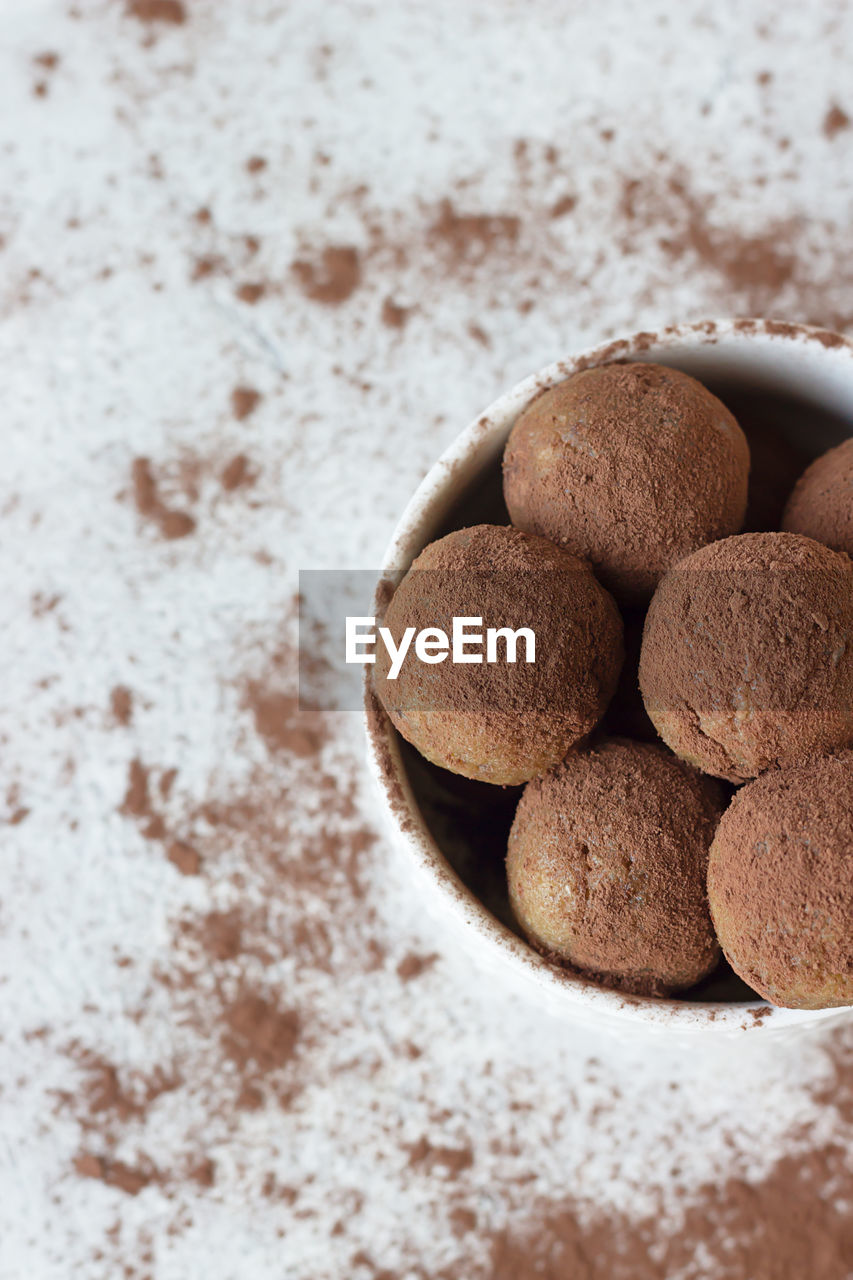 Raw vegan energy balls with cocoa powder, chickpea and peanut butter. clean eating concept. 