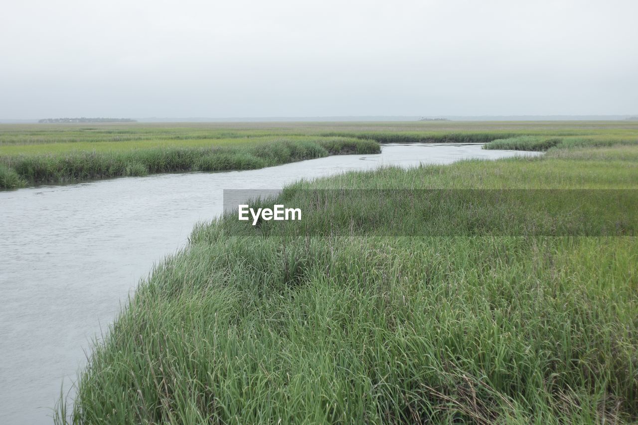 Scenic view of land against sky