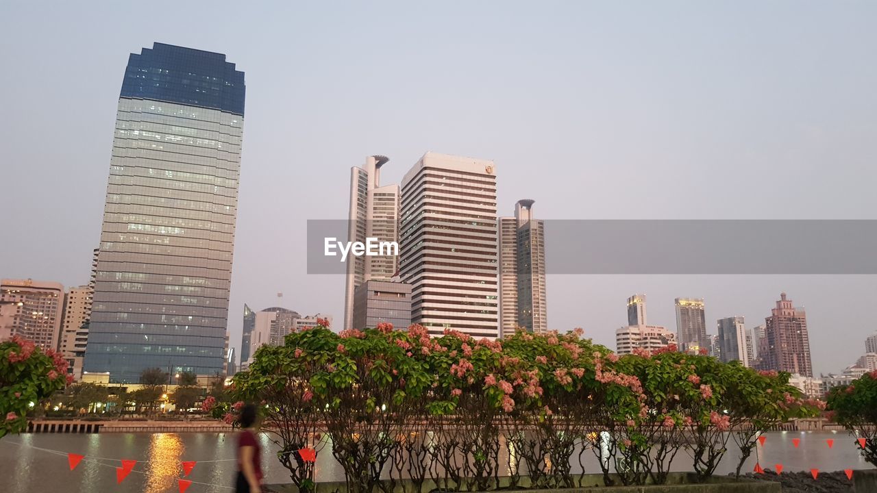 MODERN BUILDINGS AGAINST SKY IN CITY