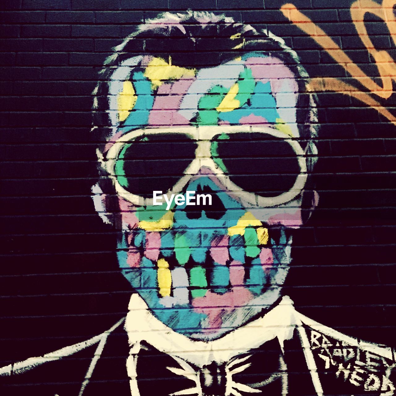 multi colored, paint, close-up, architecture, built structure, outdoors, day, human skull