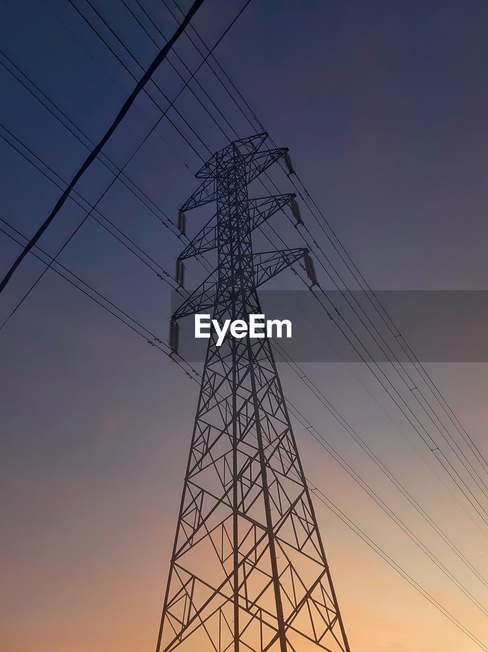 low angle view of electricity pylon