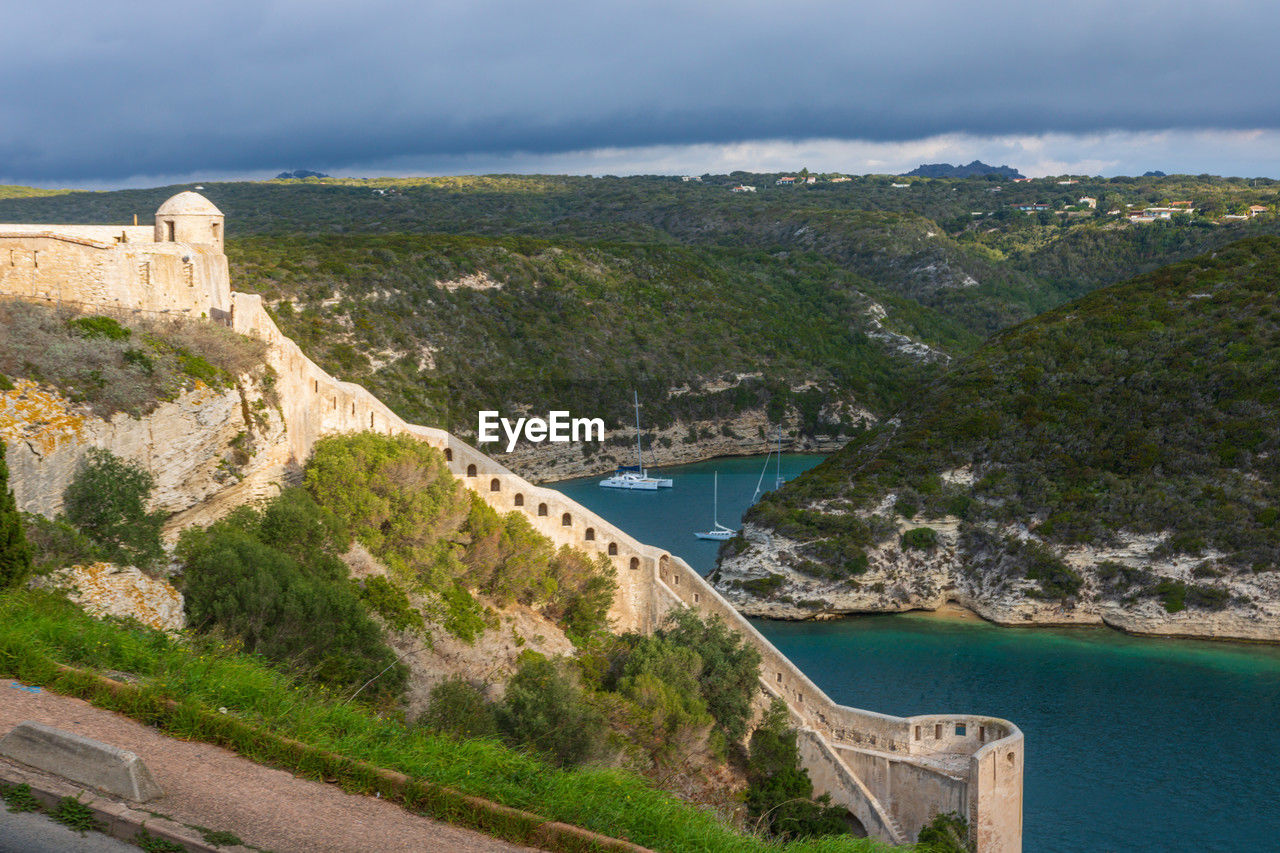 scenic view of sea against mountain