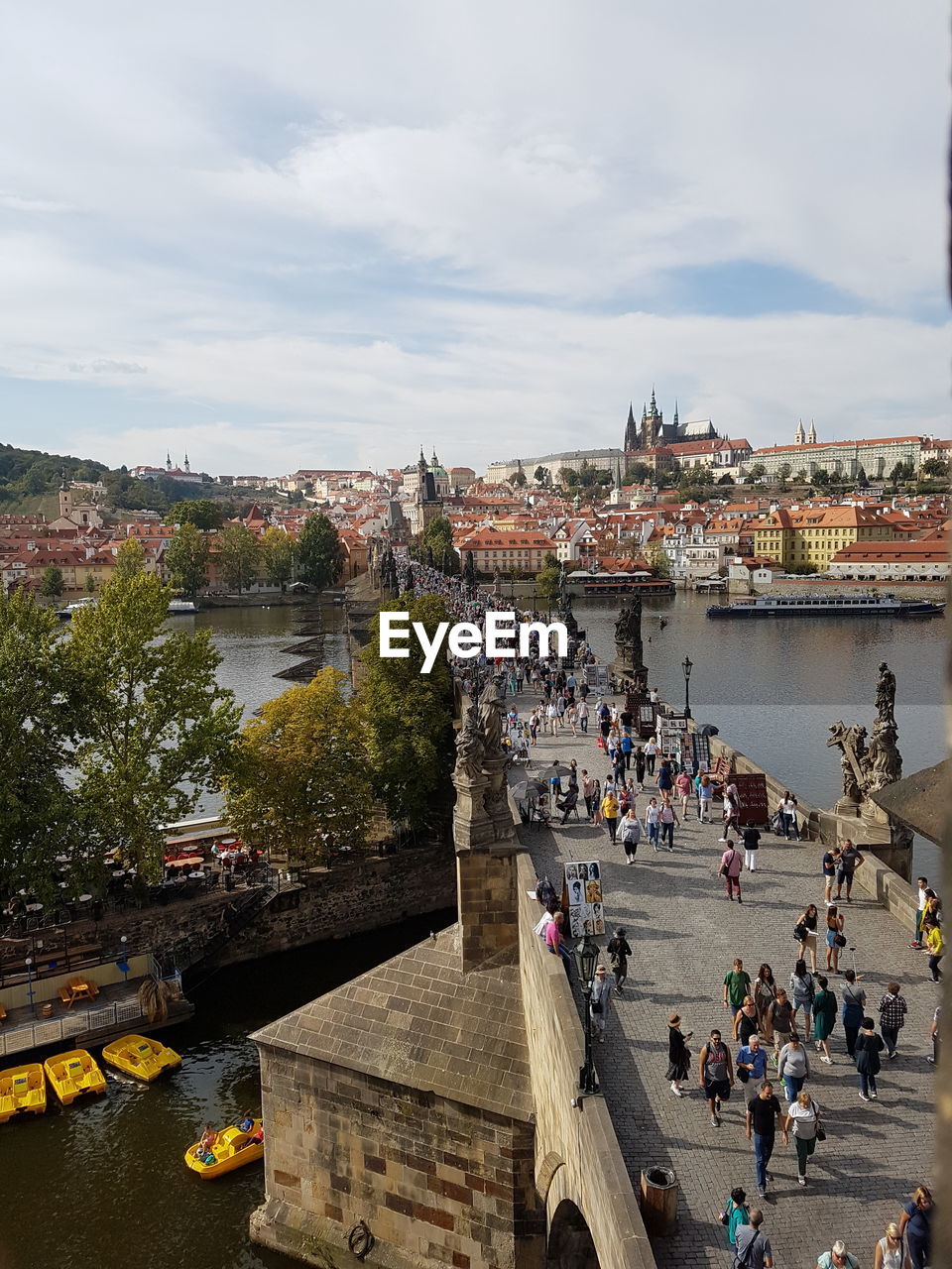 The charles bridge is 520m long and 10m wide.  its construction was started by charles iv in 1357.