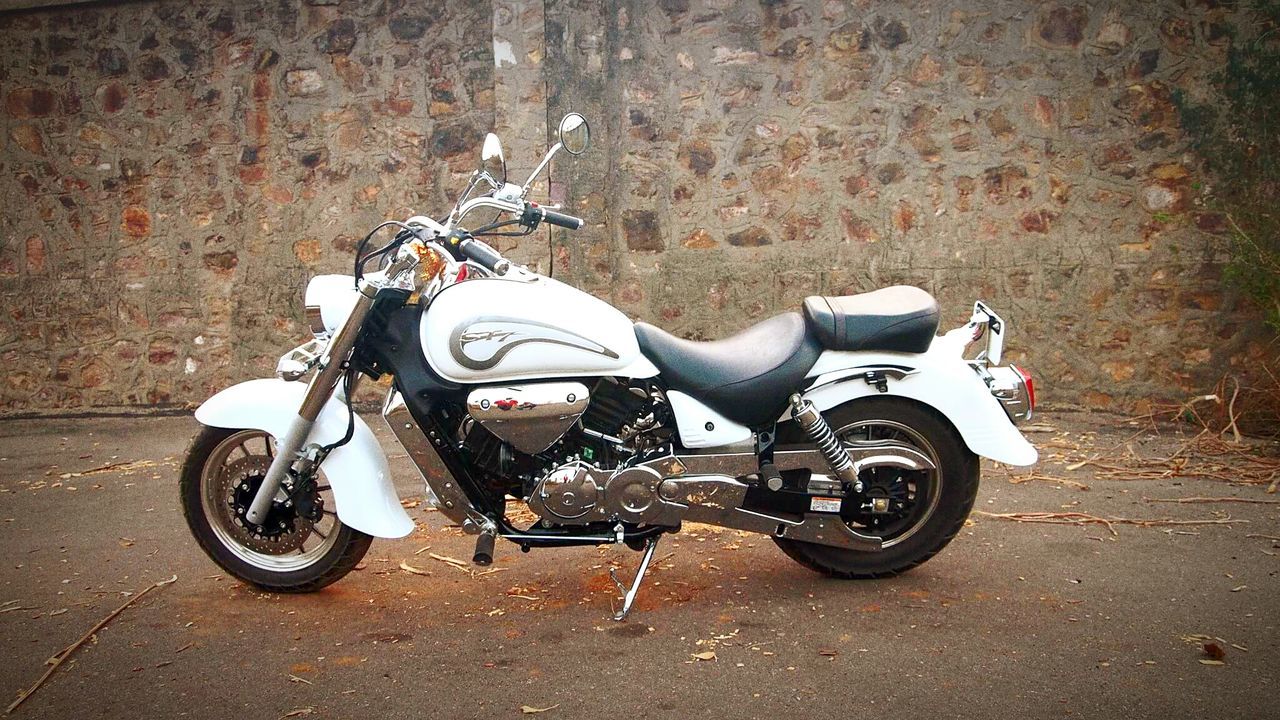 MOTORCYCLE PARKED ON ROAD