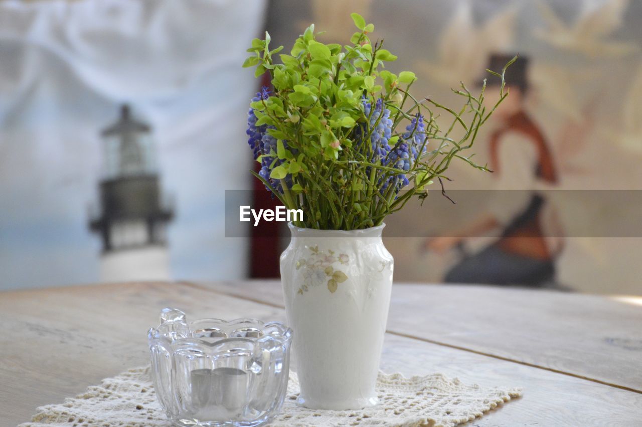 Close-up of glass vase on table