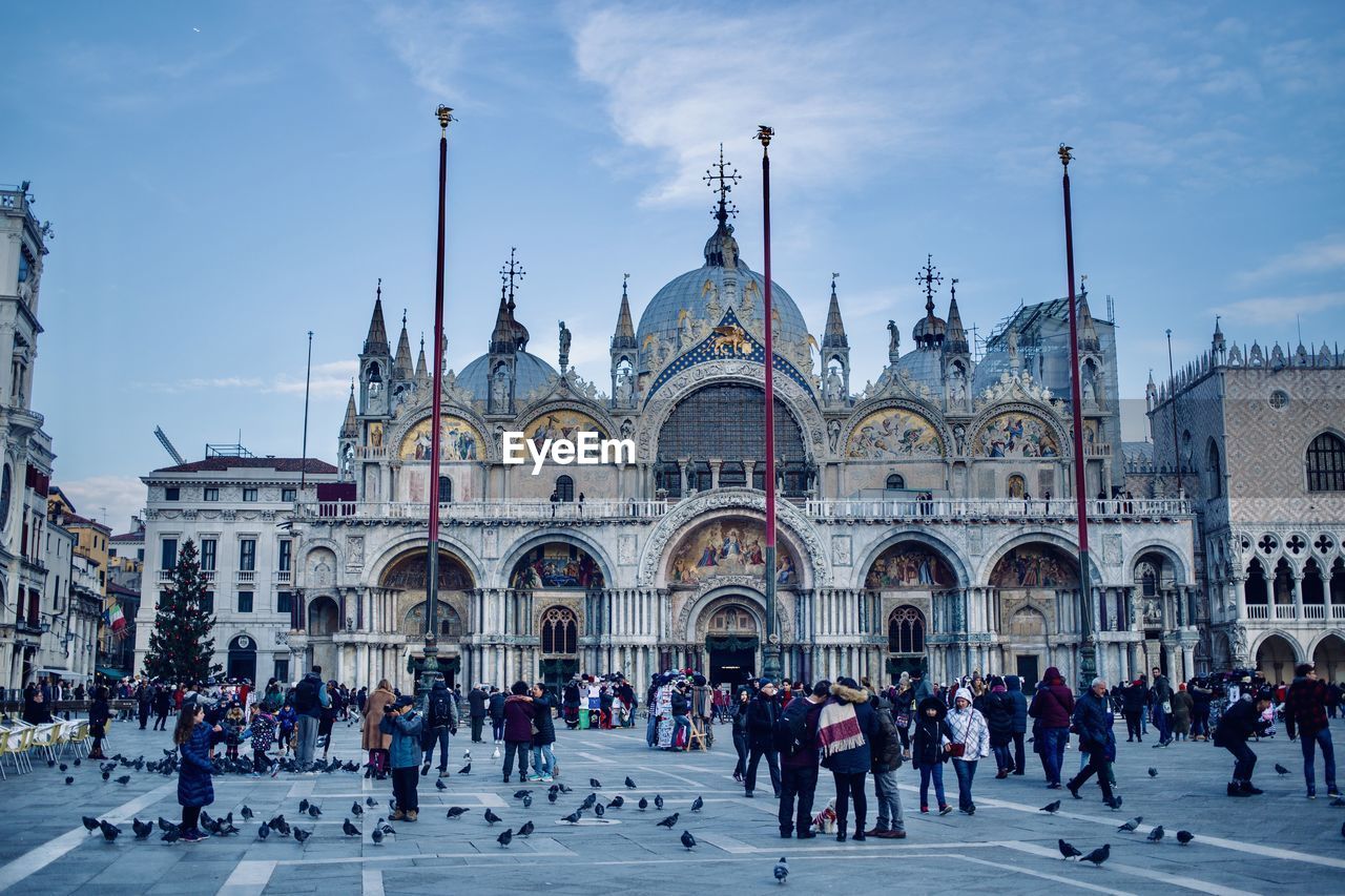 Group of people in front of buildings in venice 