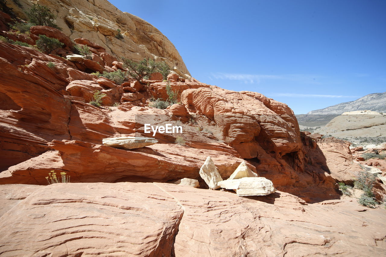 Rock formation on mountain against sky