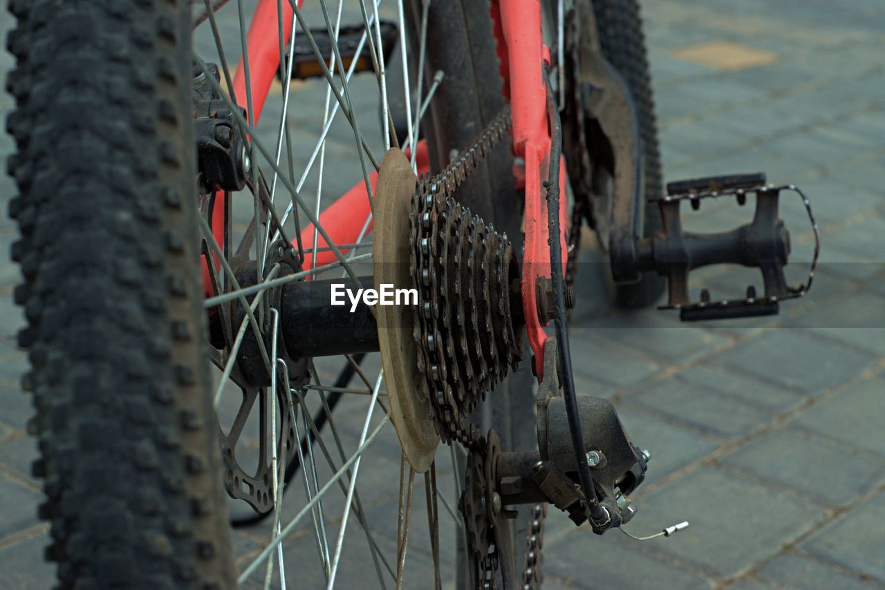 Close-up of bicycle on street