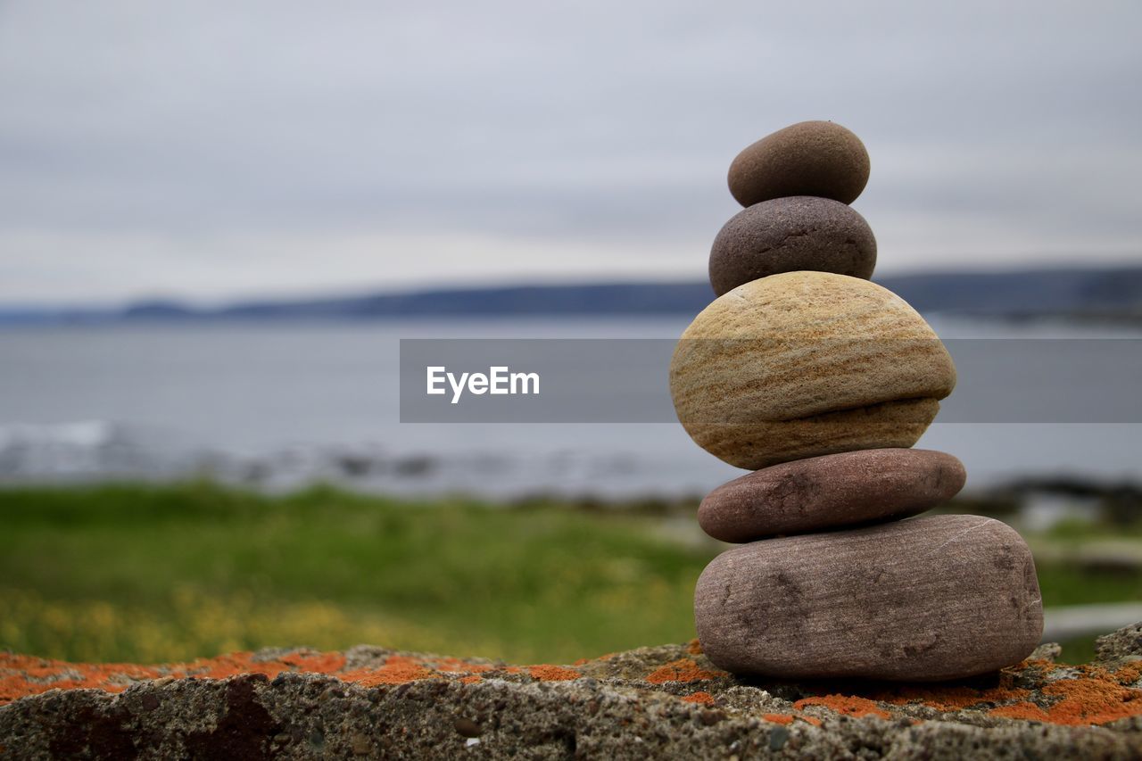 STACK OF STONES ON PEBBLES