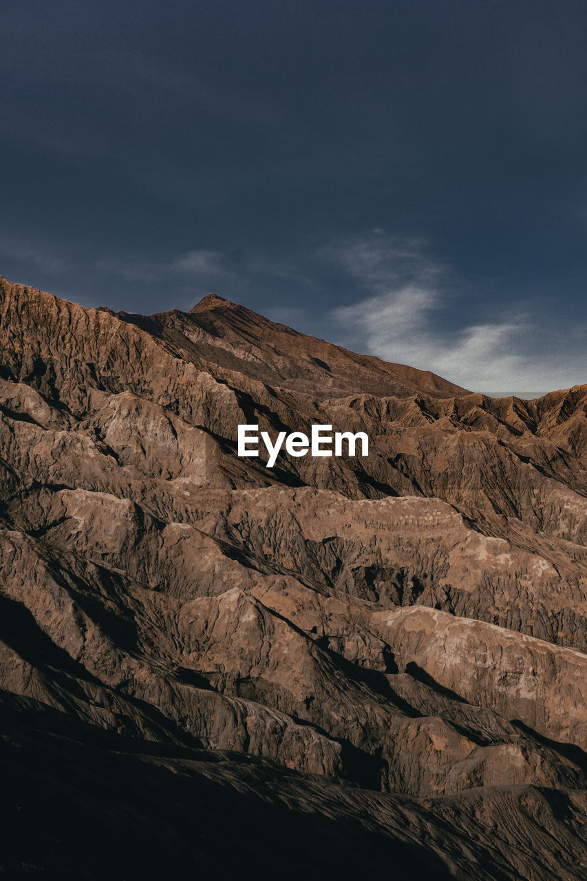 Scenic view of rocky mountains against sky