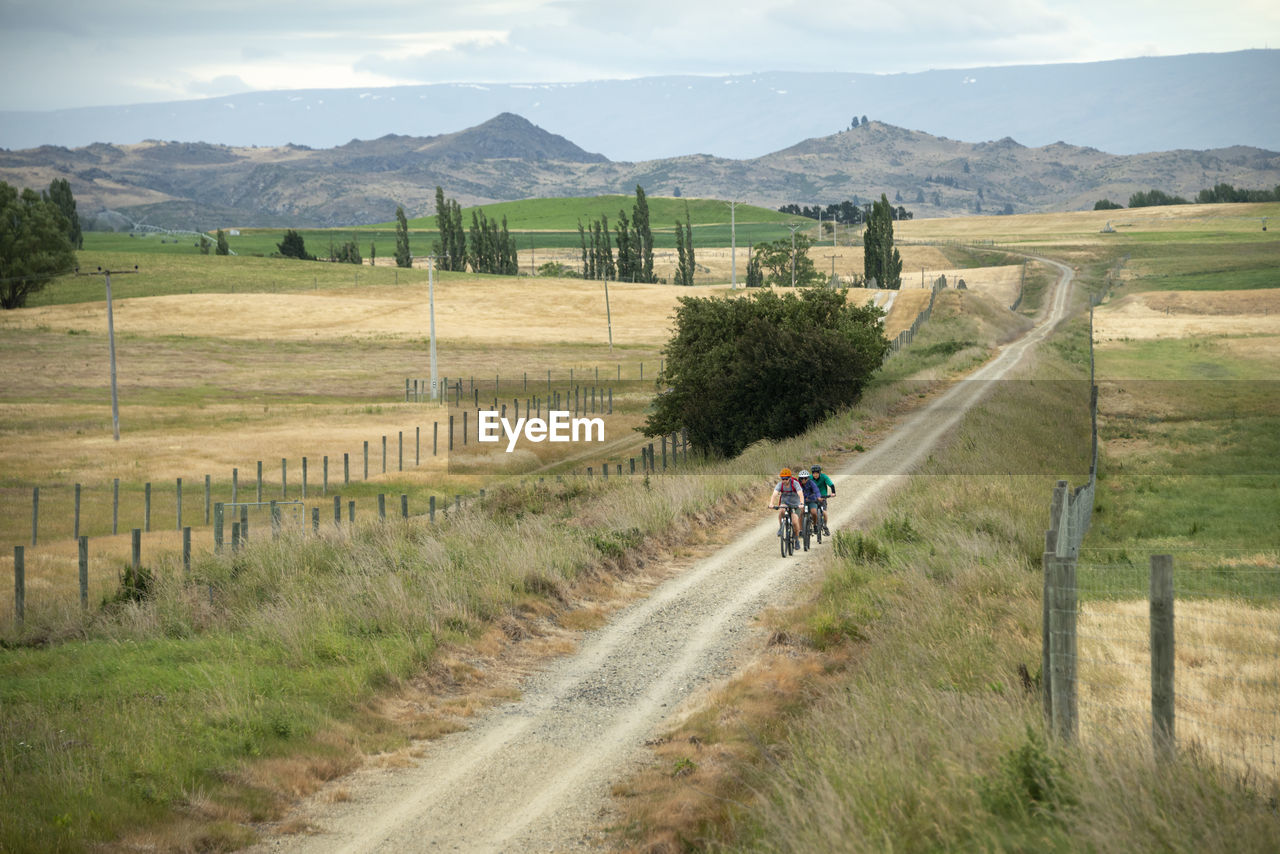 ROAD PASSING THROUGH FIELD