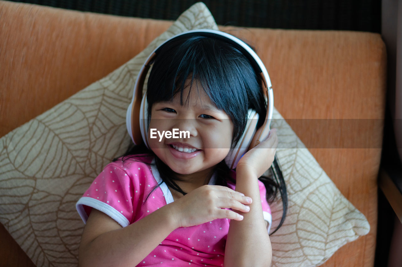 Portrait of smiling girl at home