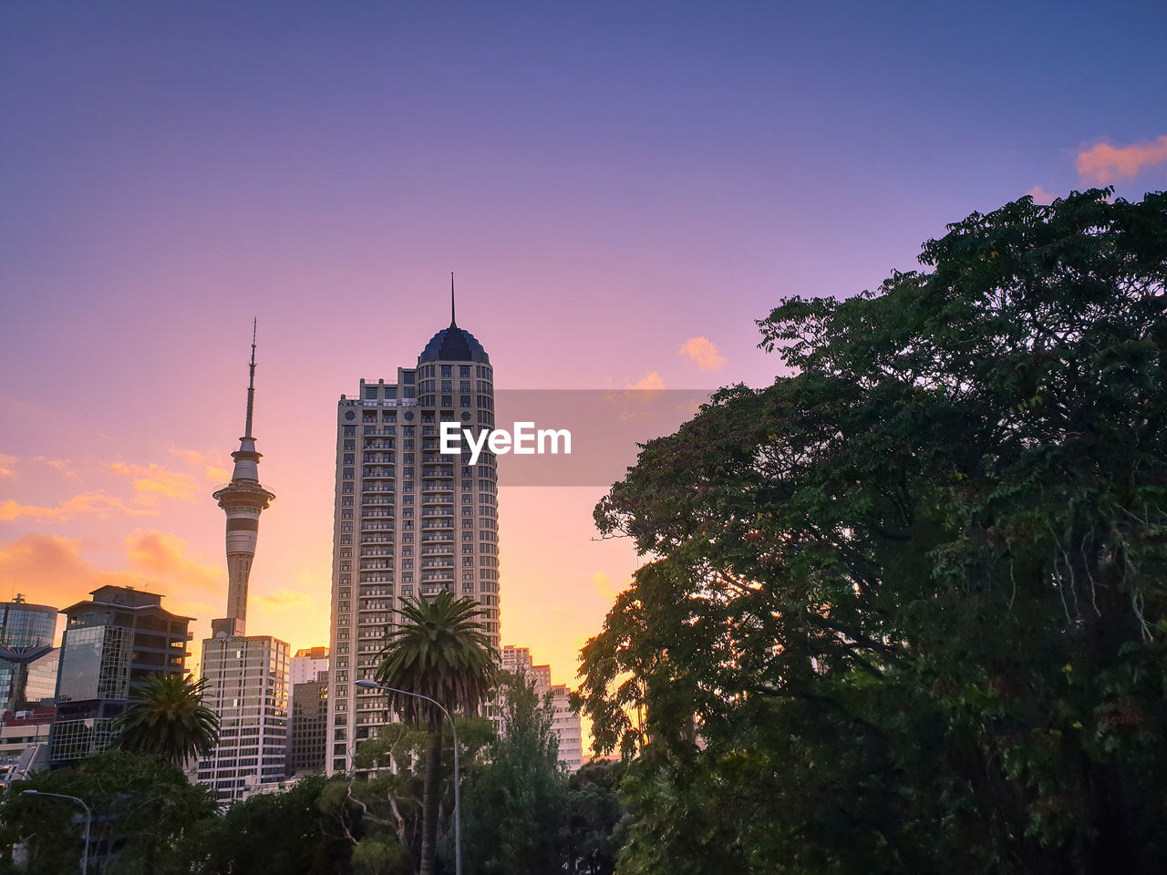 VIEW OF BUILDINGS IN CITY DURING SUNSET