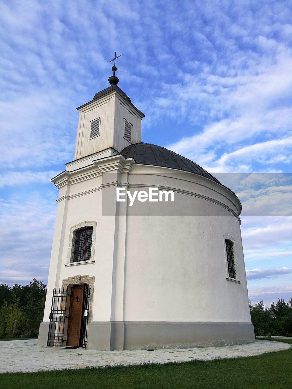 Low angle view of a chapel against sky