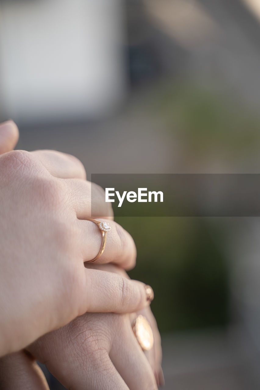 Engagement ring on finger