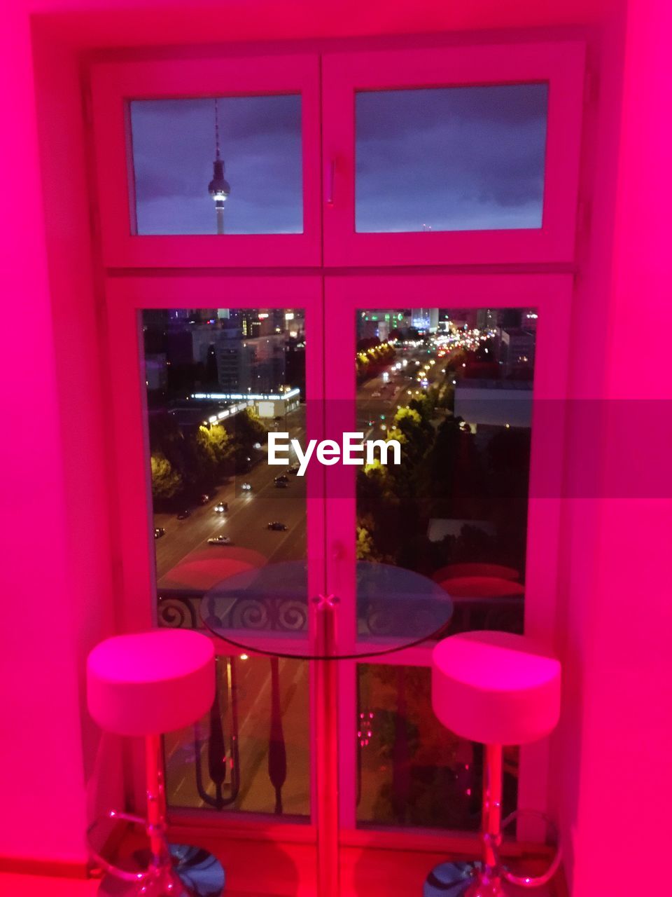 CLOSE-UP OF PINK ILLUMINATED WINDOW