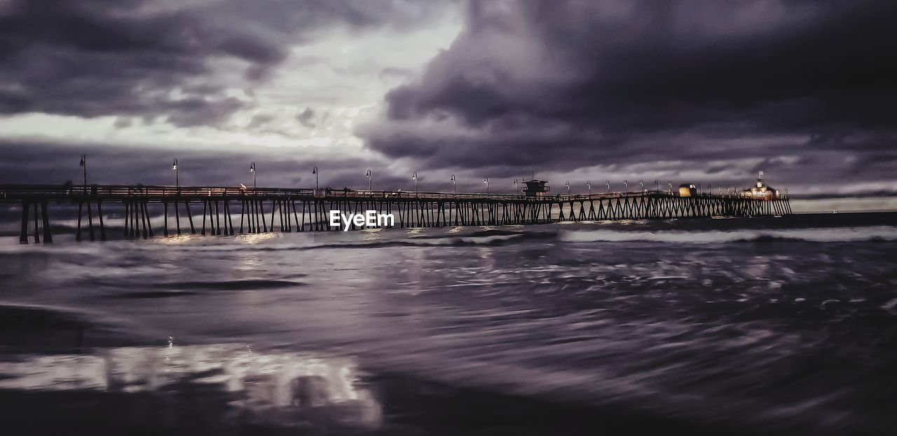 PIER OVER SEA AGAINST SKY