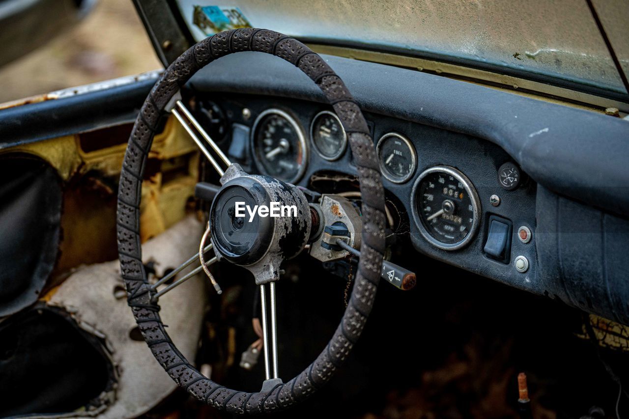 car, vehicle, mode of transportation, transportation, land vehicle, motor vehicle, vintage car, control panel, steering wheel, dashboard, antique car, metal, wheel, close-up, vehicle interior, no people, sports car, car interior, speedometer, luxury vehicle, automobile, retro styled, day, travel, old, outdoors