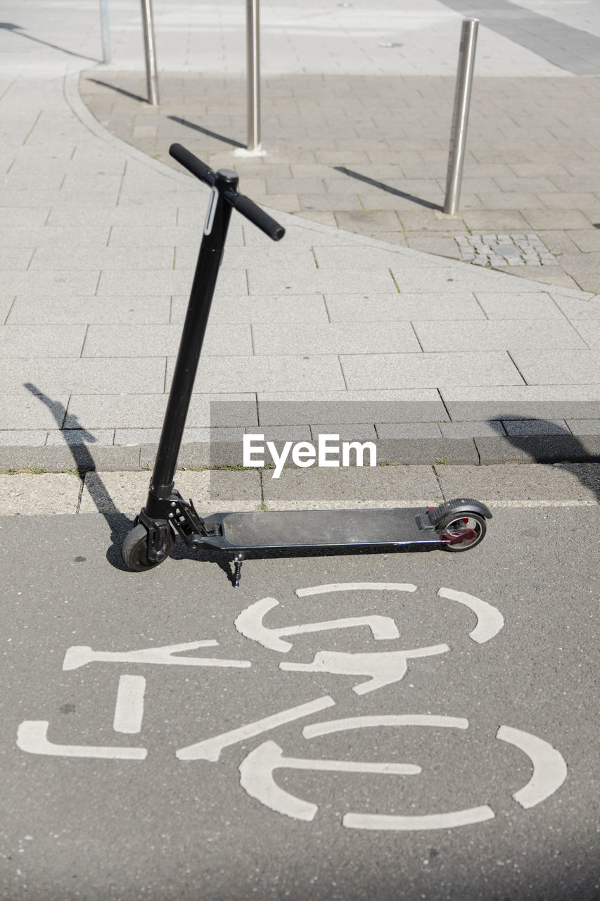 E-scooter parked on bicycle lane in the city