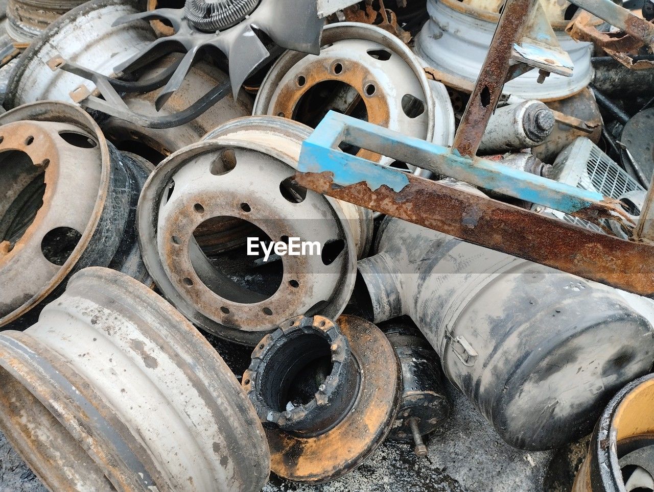 scrap, metal, large group of objects, abandoned, no people, wheel, damaged, rusty, decline, transportation, deterioration, day, old, iron, rundown, abundance, mode of transportation, vehicle, auto part, high angle view, junkyard, industry, engine, outdoors