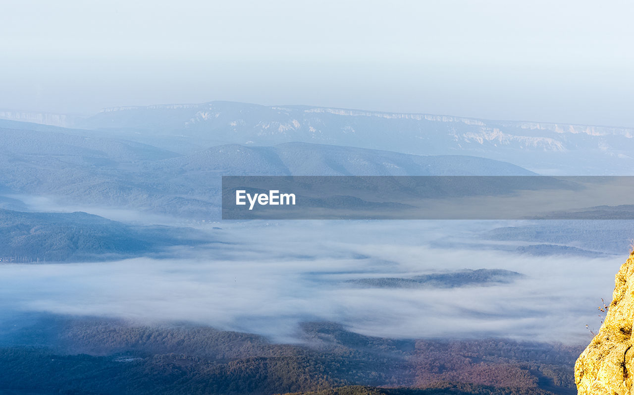 SCENIC VIEW OF MOUNTAIN AGAINST SKY