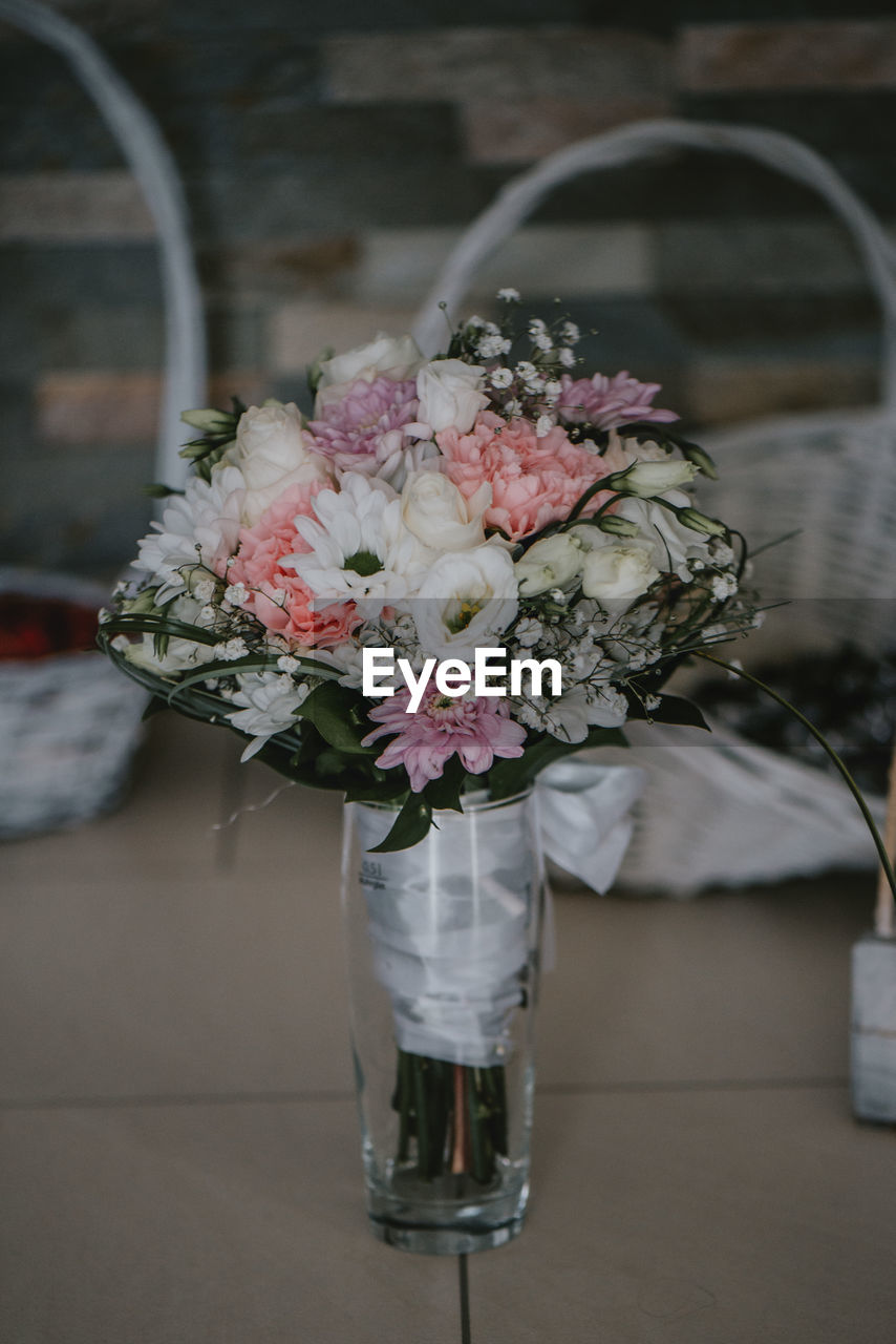 Close-up of flower vase on table