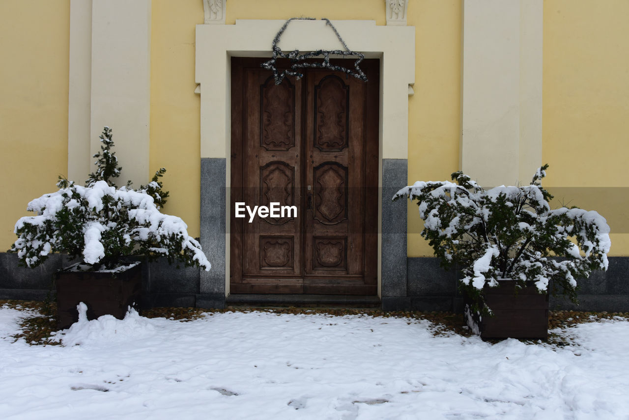 snow, door, entrance, architecture, building exterior, building, built structure, winter, house, cold temperature, nature, residential district, plant, no people, front door, closed, home, day, outdoors, wood, protection, white, doorway, security