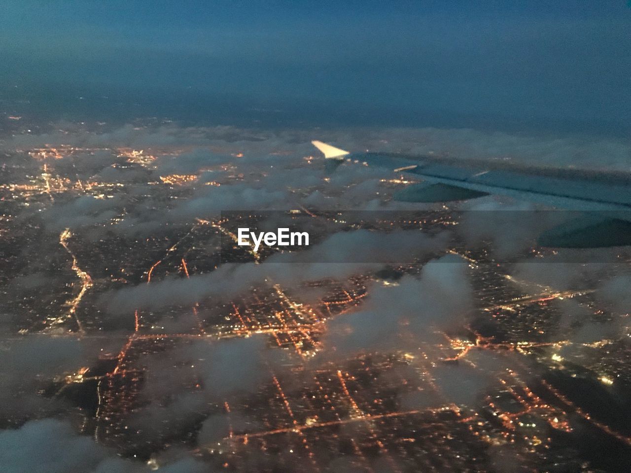 AERIAL VIEW OF ILLUMINATED CITY