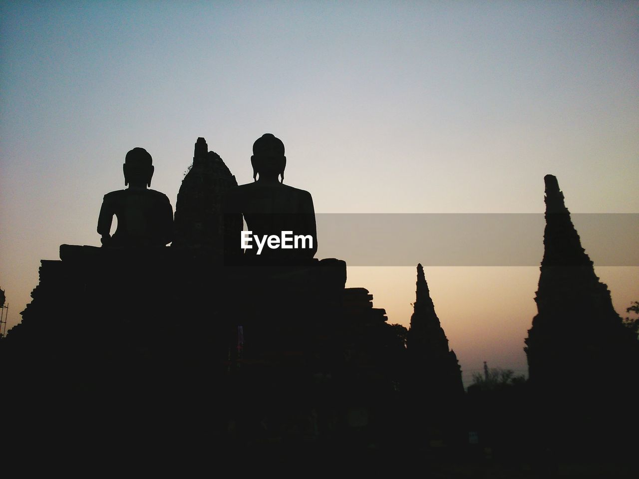 Low angle view of statue against sky