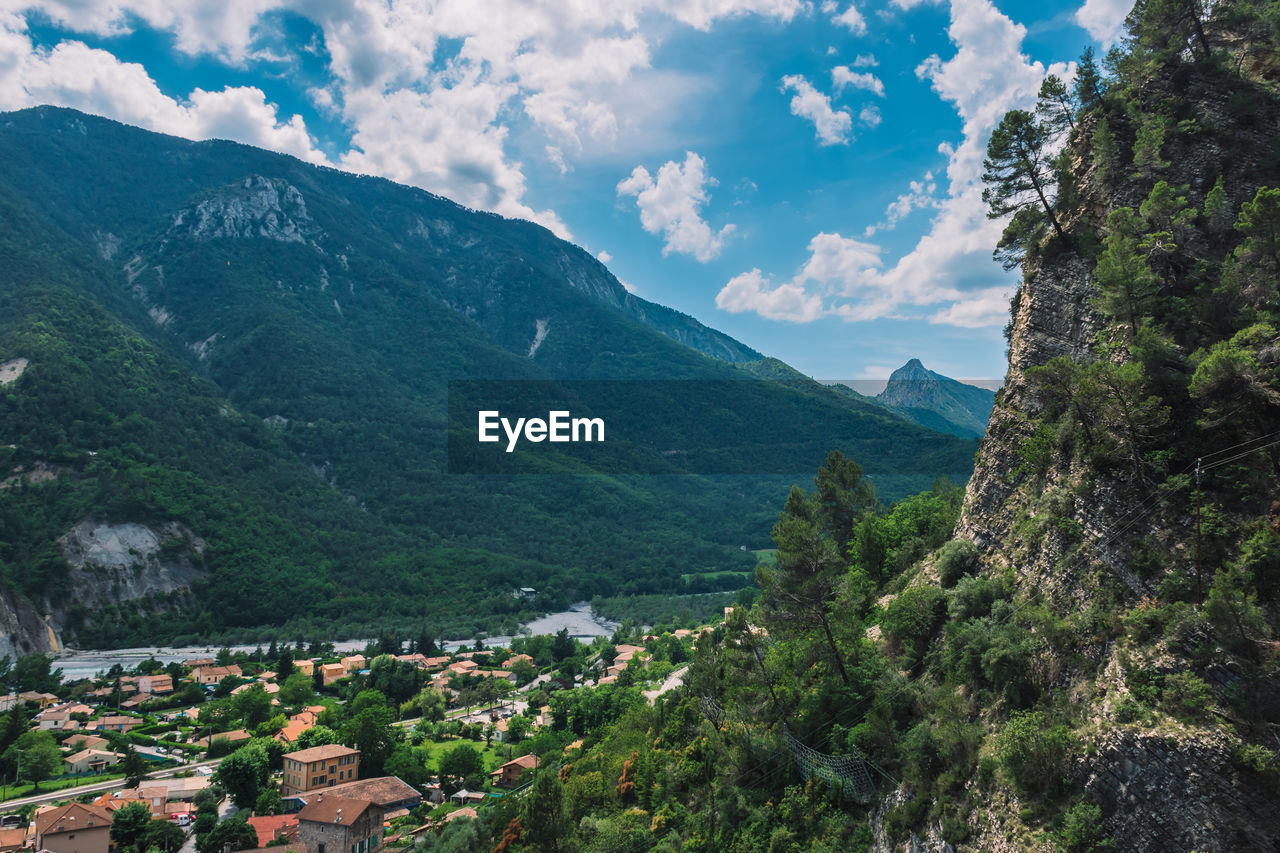 Aerial view of townscape amidst valley
