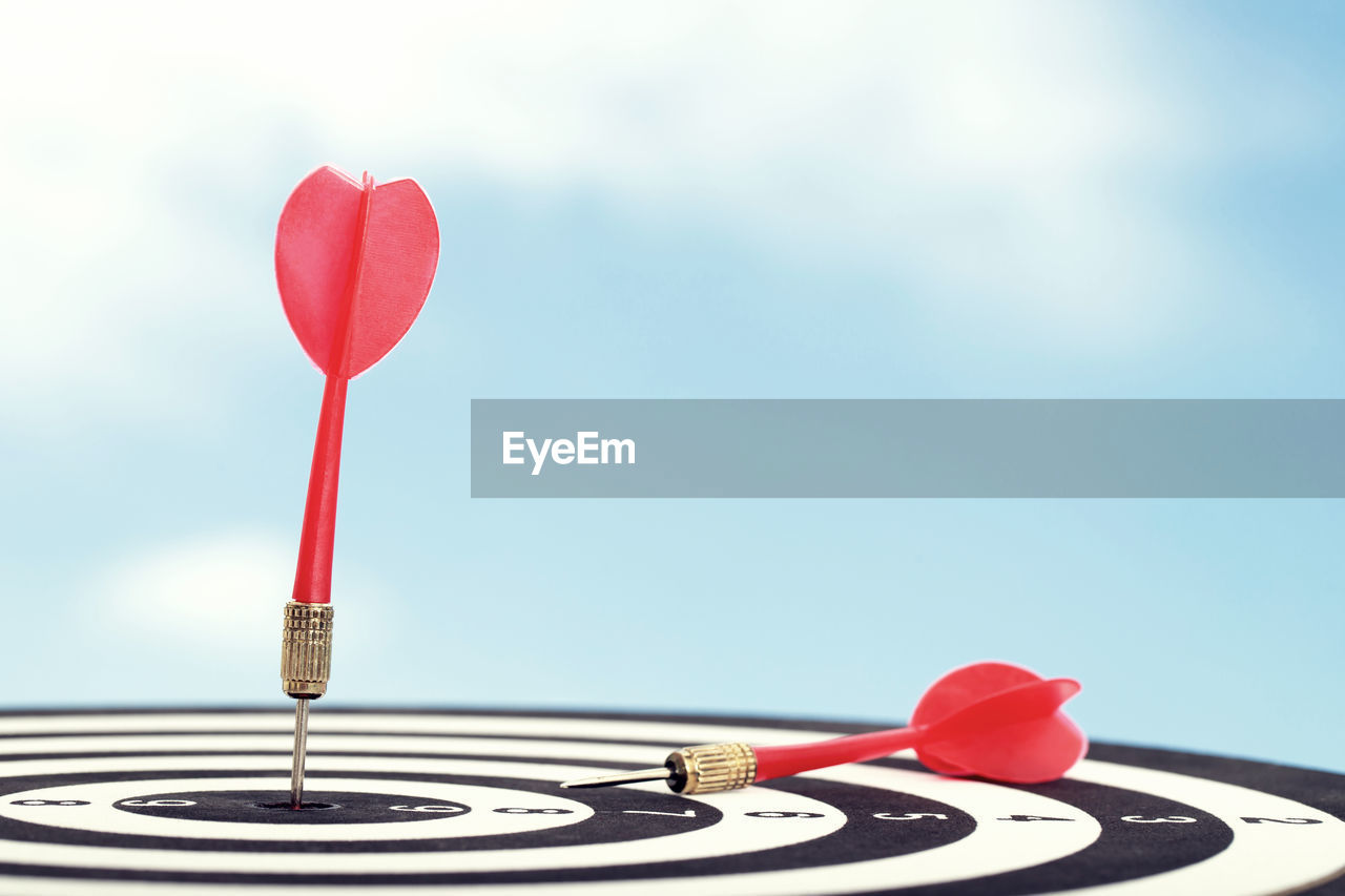 Darts and business success goals concept