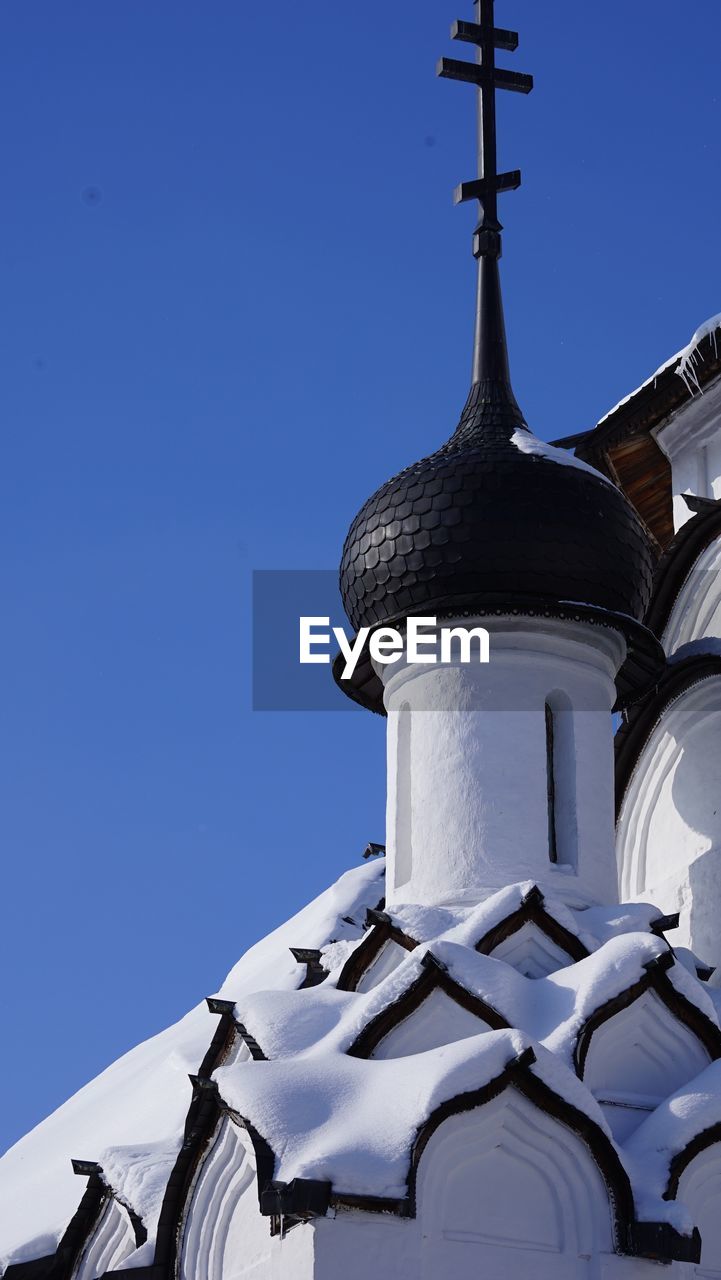 Snow roof and dom of monastery