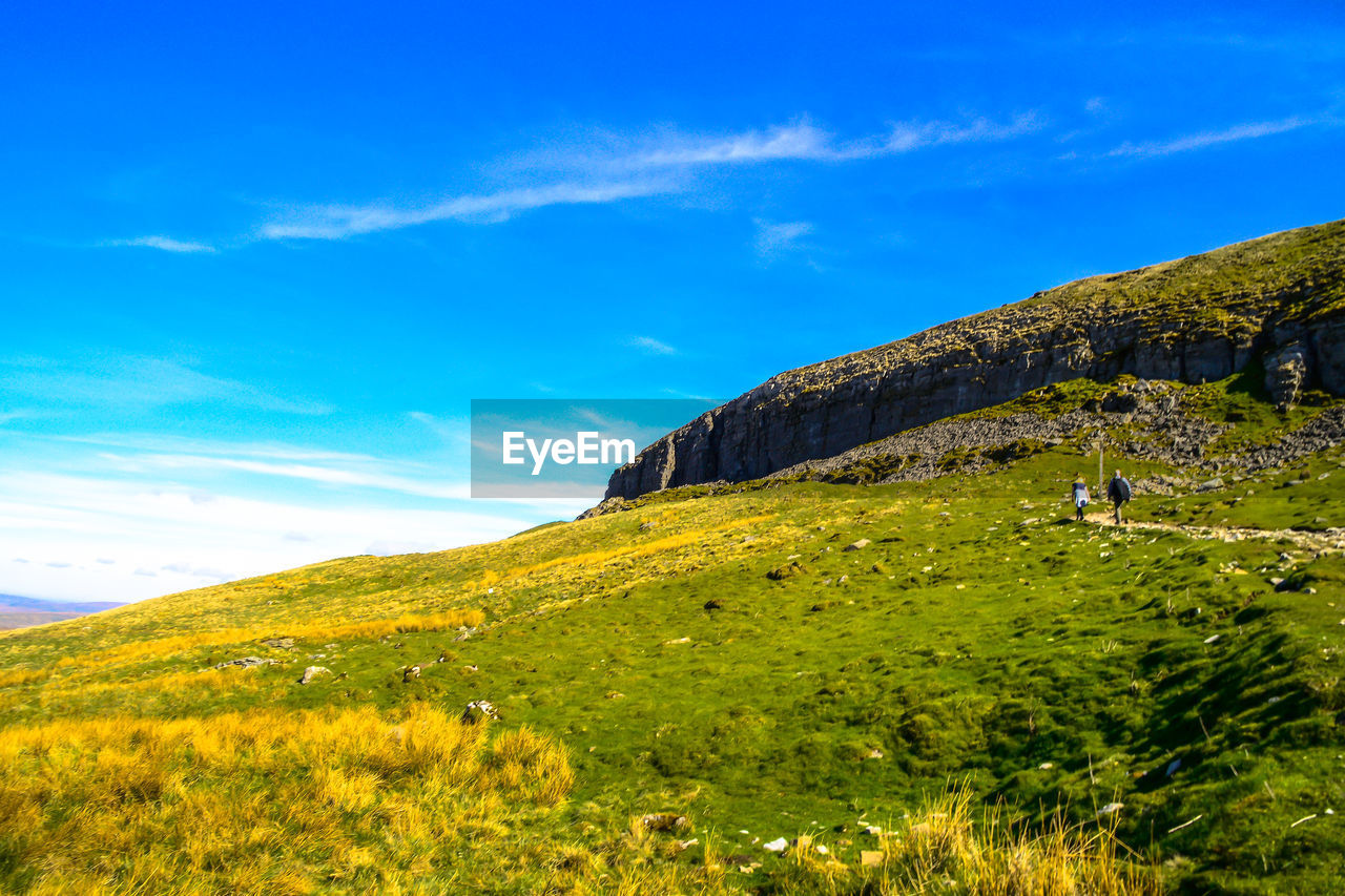 SCENIC VIEW OF MOUNTAIN AGAINST SKY