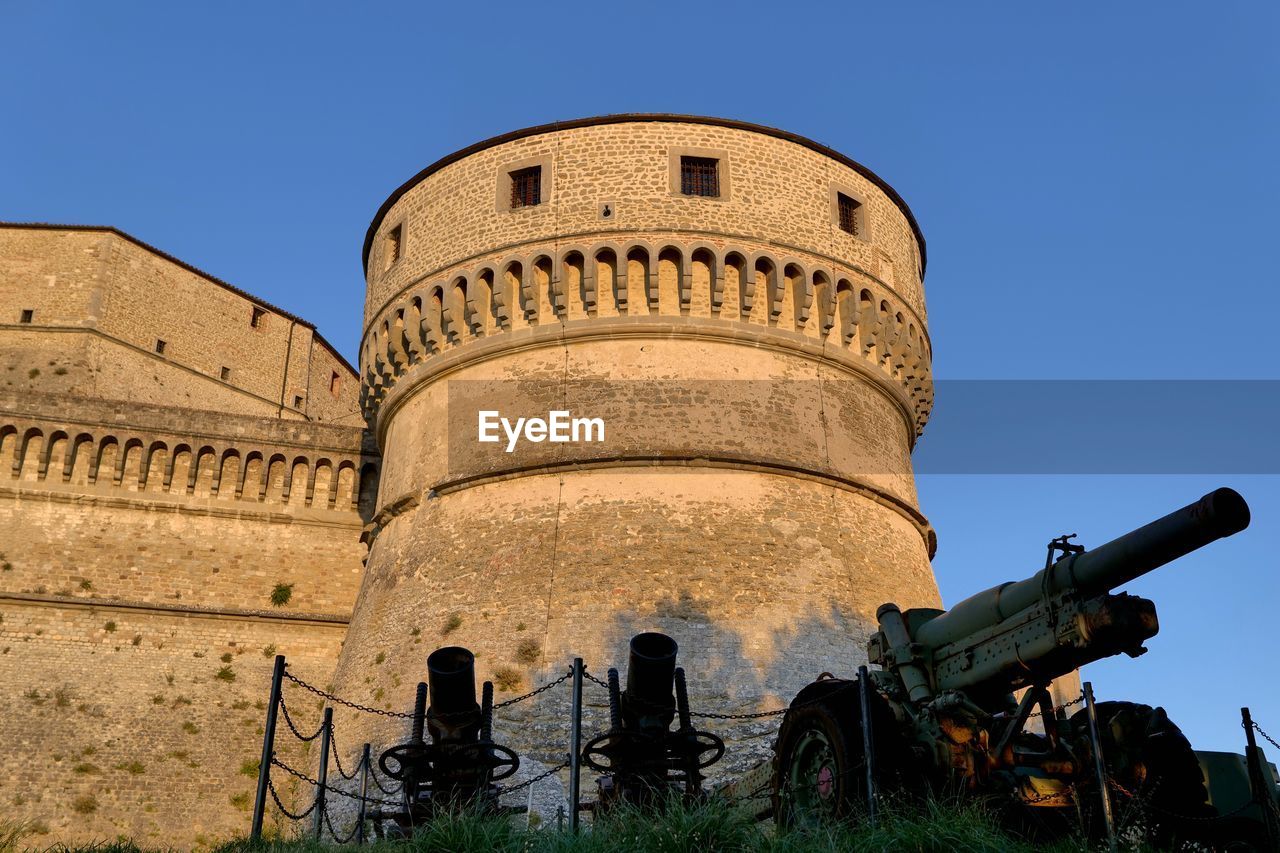 low angle view of historical building against clear blue sky