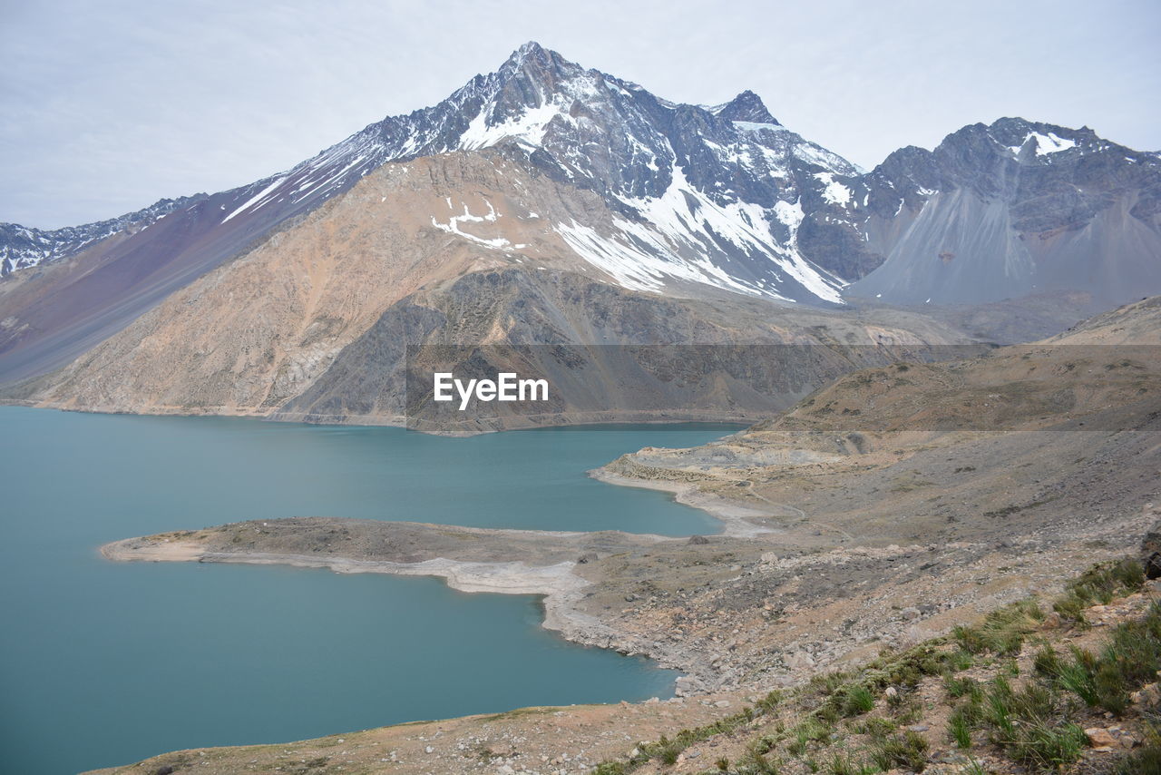 SCENIC VIEW OF LAKE AND MOUNTAINS