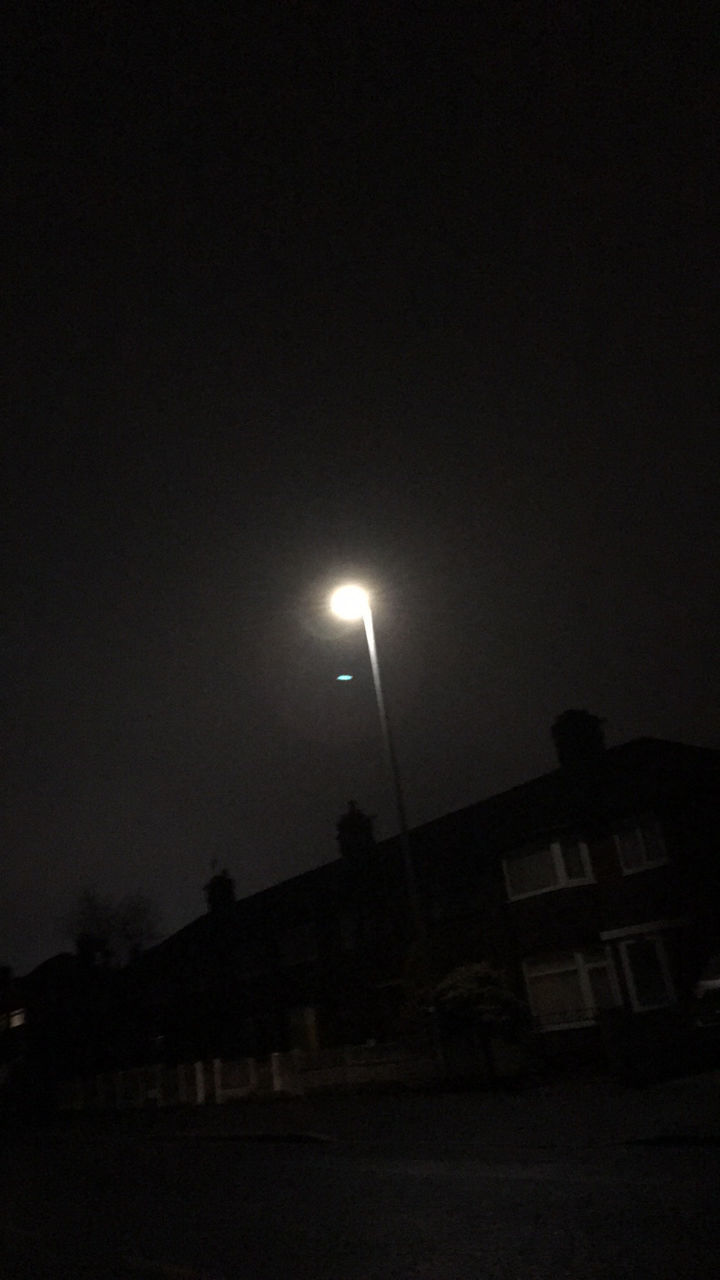 LOW ANGLE VIEW OF ILLUMINATED STREET LIGHT AGAINST SKY