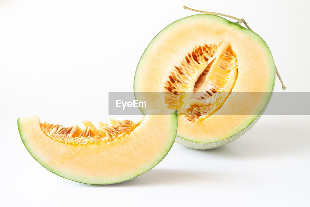 Close-up of cantaloupe against white background