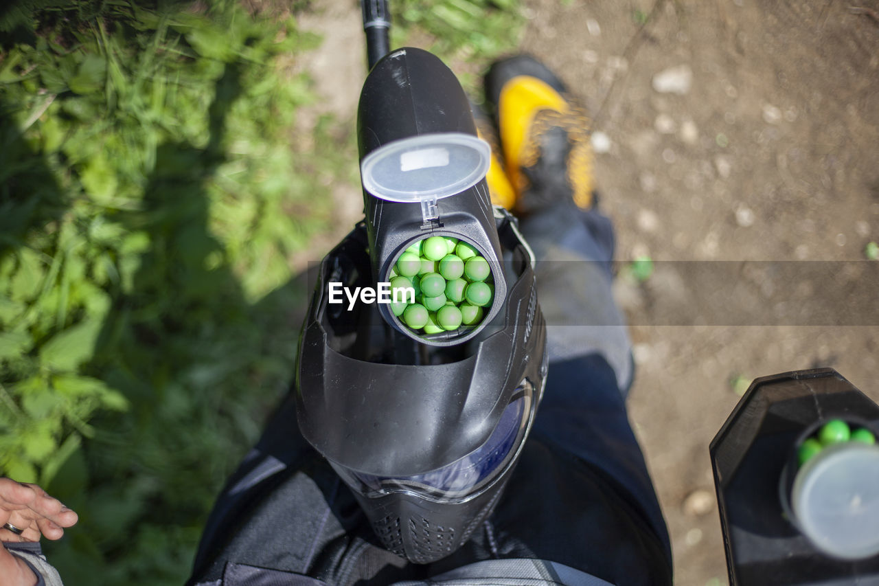 Balls with paint in jar. sports equipment. preparation for tactical shooting at target.