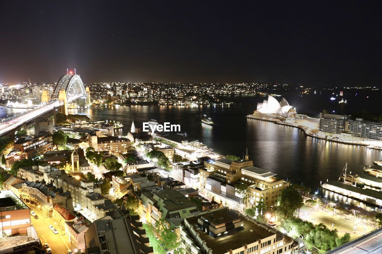 HIGH ANGLE VIEW OF CITY BUILDINGS AT NIGHT