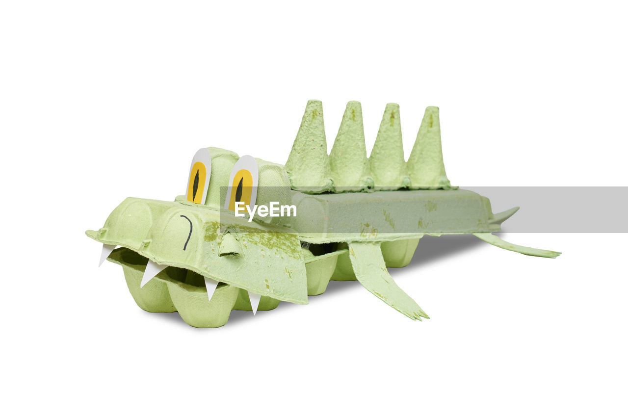 high angle view of wooden clothespins against white background