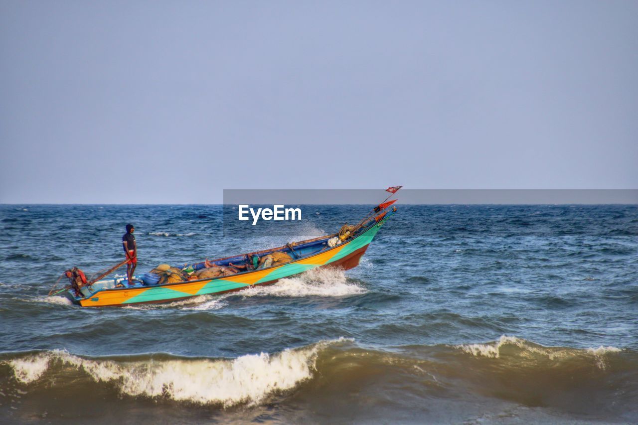 NAUTICAL VESSEL ON SEA AGAINST CLEAR SKY