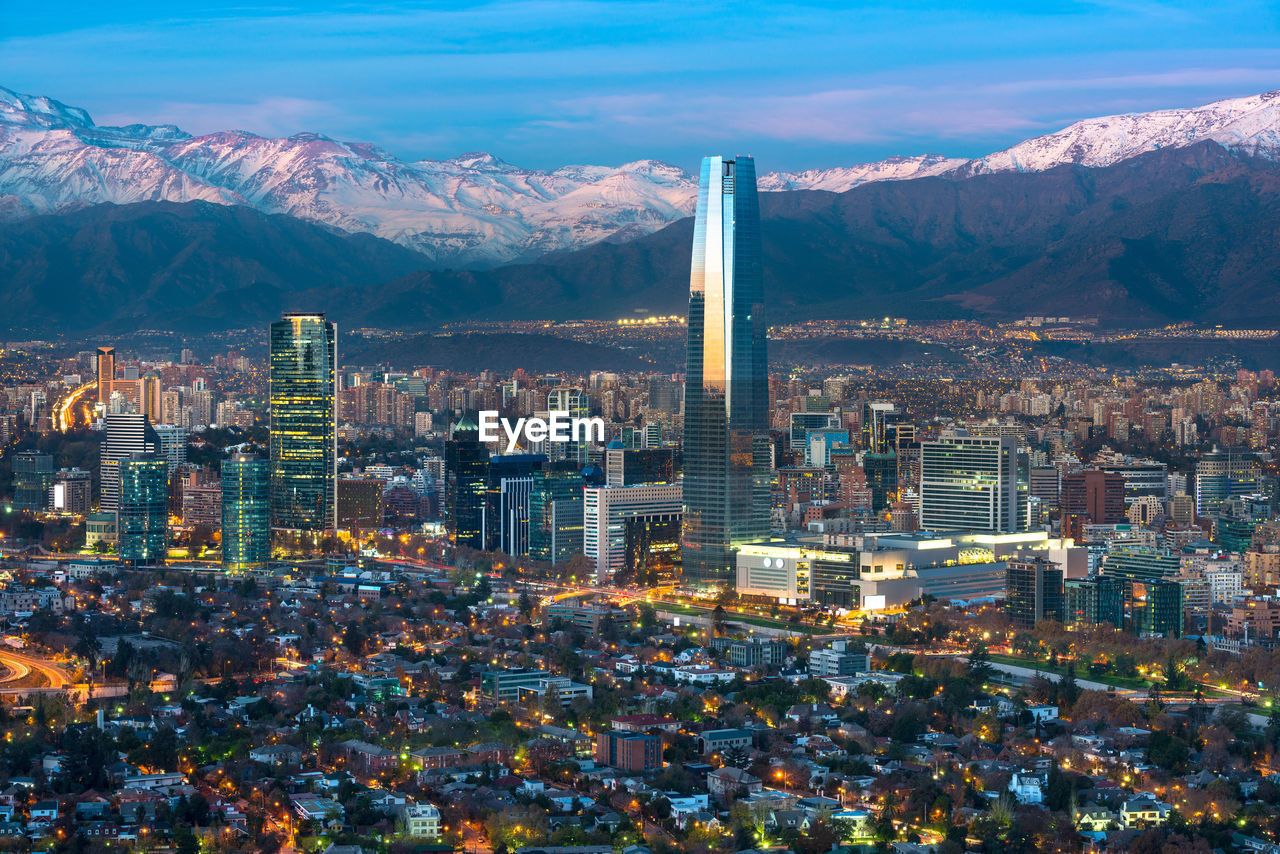 View of providencia and las condes districts in front of los andes mountain range, santiago de chile