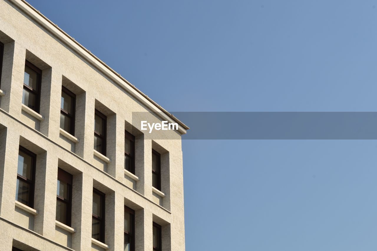 Low angle view of building against clear sky