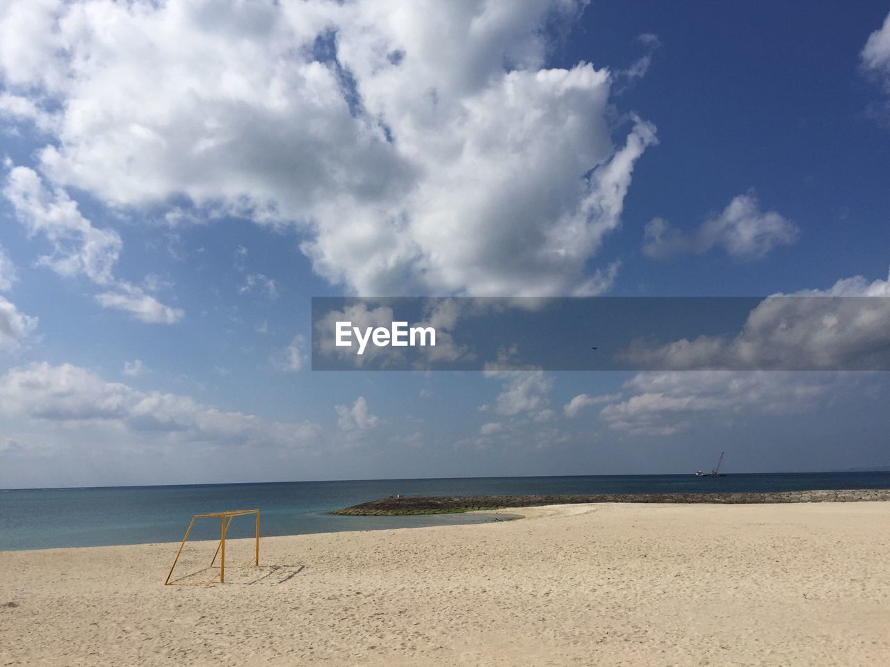 Scenic view of beach and sea against sky