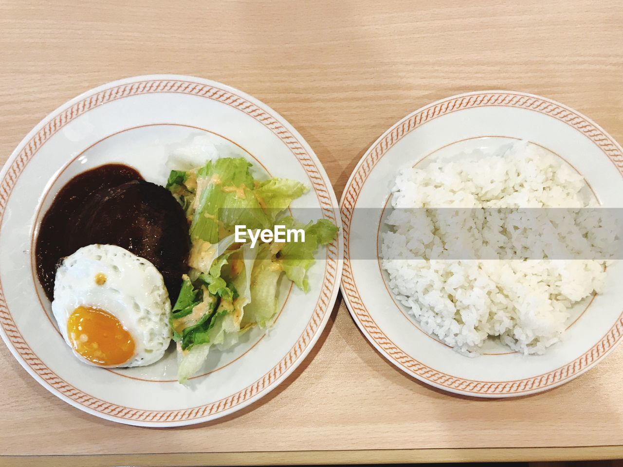 Directly above shot of food in plates on table