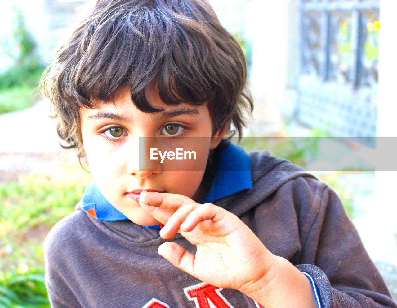 Close-up portrait of boy outdoors