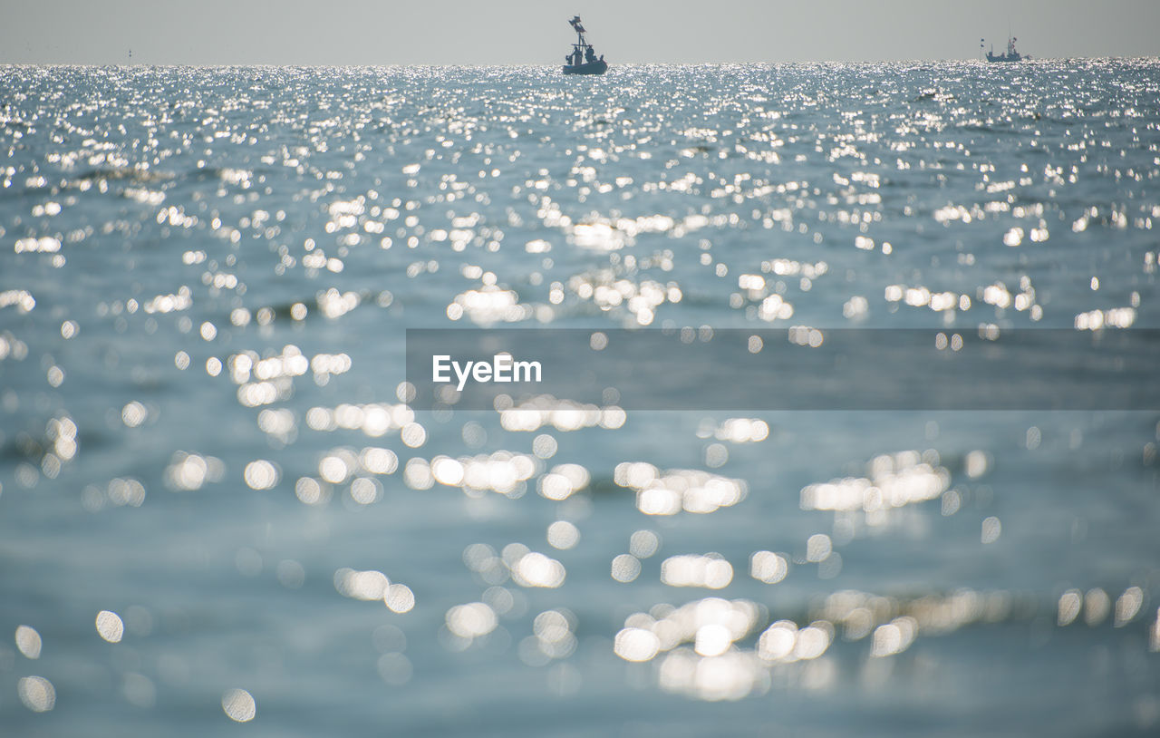 Scenic view of sea during sunny day