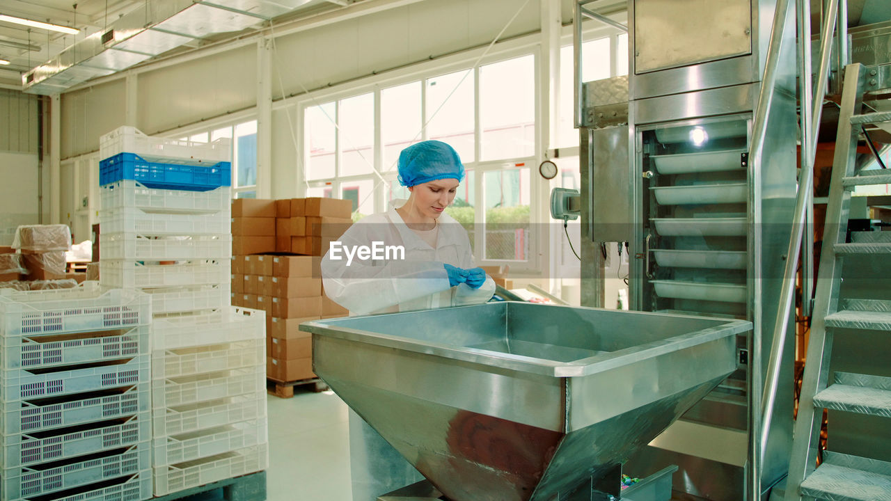 rear view of scientist working at laboratory