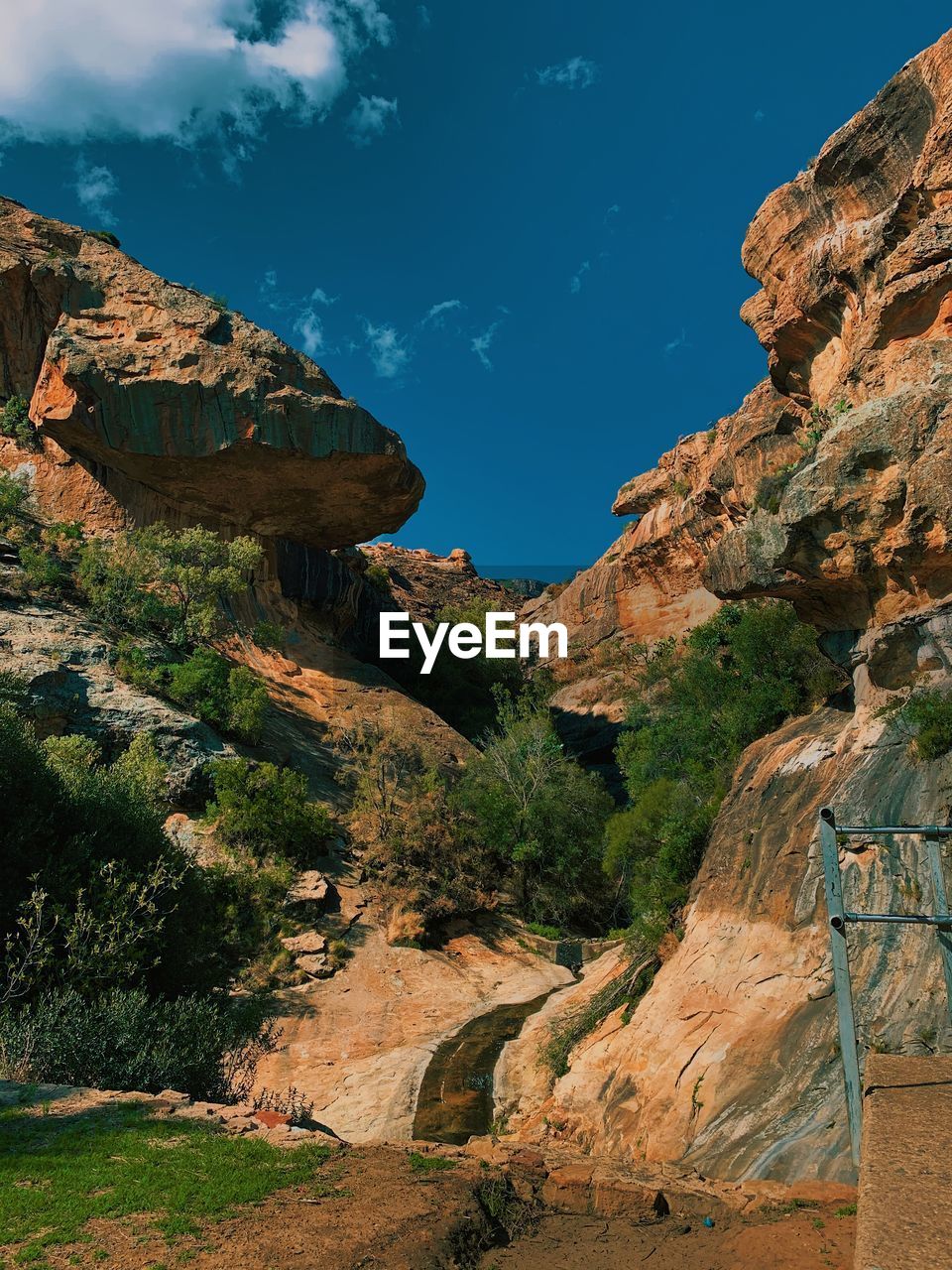ROCK FORMATIONS AGAINST SKY